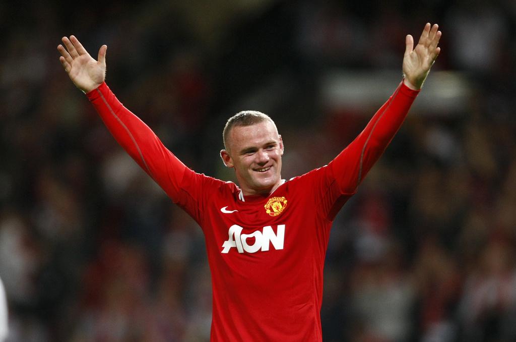 Avec Wayne Rooney, Manchester United peut viser une nouvelle finale. [Keystone - Tim Hales]