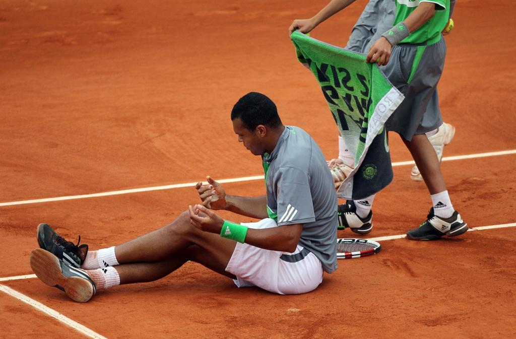 Tout le désarroi de Tsonga. [KEYSTONE - KERIM OKTEN]