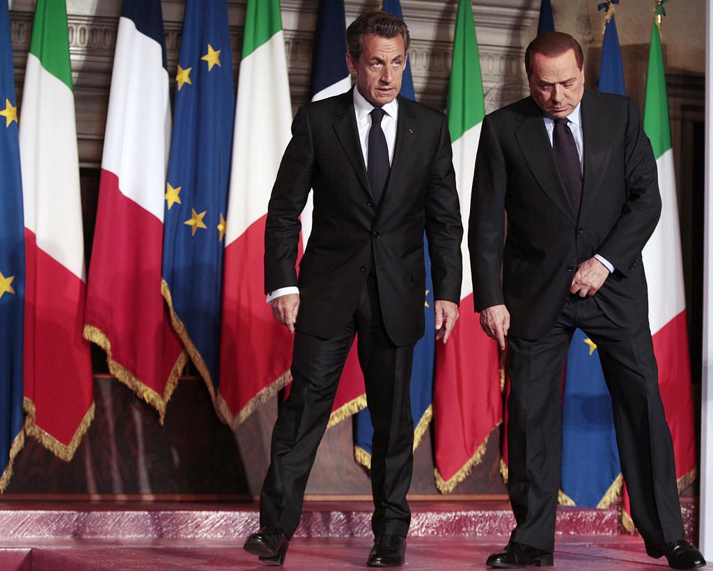 Pour Nicolas Sarkozy et Silvio Berlusconi "les pressions aux frontières communes entraînent des conséquences pour l'ensemble des Etats membres". [KEYSTONE - Gregorio Borgio]