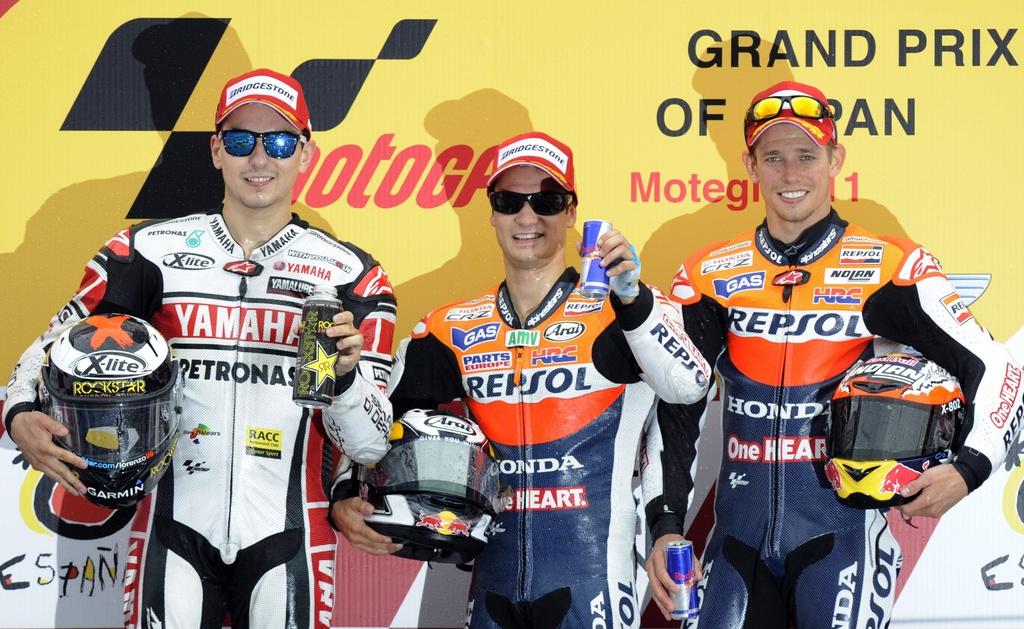 Un podium royal en MotoGP avec Lorenzo, Pedrosa et Stoner (de gauche à droite). [KEYSTONE - FRANCK ROBICHON]