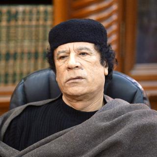 Mouammar Kadhafi, en fuite et introuble, ne lâche pas prise. [Jack Guez]