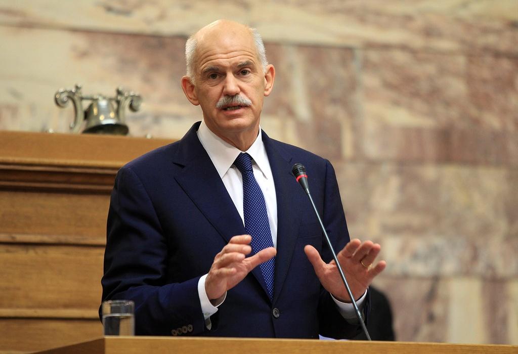 Devant les parlementaires, Georges Papandréou a annoncé vouloir commencer les négociations avec l'opposition. [KEYSTONE - PANTELIS SAITAS]