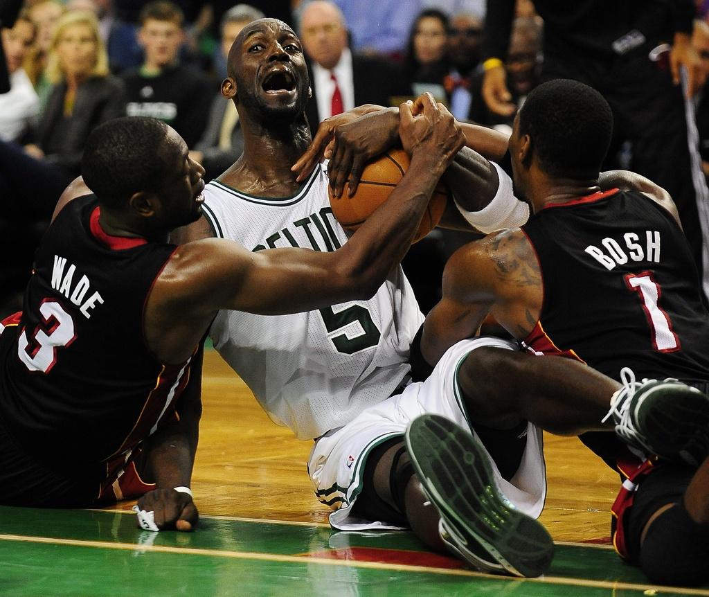 Miami, à l'image de Wade et de Bosh, a doublé ses efforts pour faire chuter Boston et Kevin Garnett. [KEYSTONE - Matt Campbell]