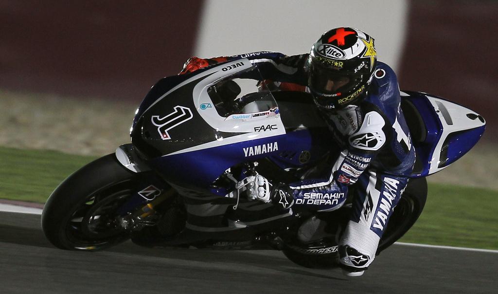 Jorge Lorenzo a droit au "no1" du champion du monde en titre. [Keystone - Osama Faisal]