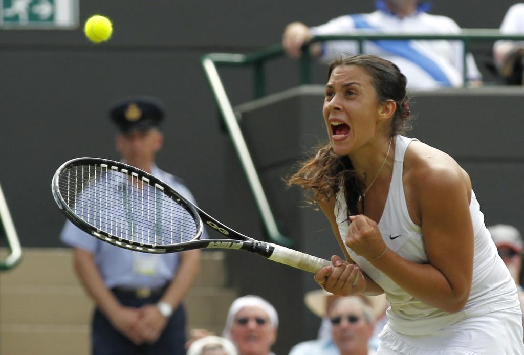 Finaliste à Wimbledon en 2007, Marion Bartoli poursuit son chemin à Londres... [Keystone - Anja Niedringhaus]