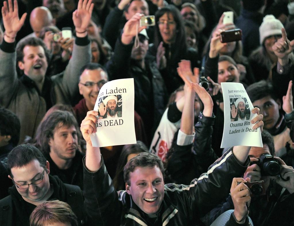 La foule était très dense à Times Square la nuit dernière. [KEYSTONE - Peter Foley]