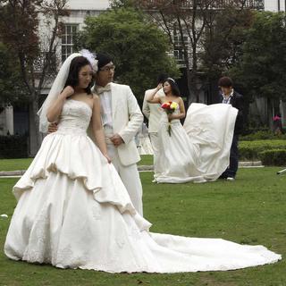 Des milliers de couples se sont mariés en Chine le 11.11.11. [PennyYoung]
