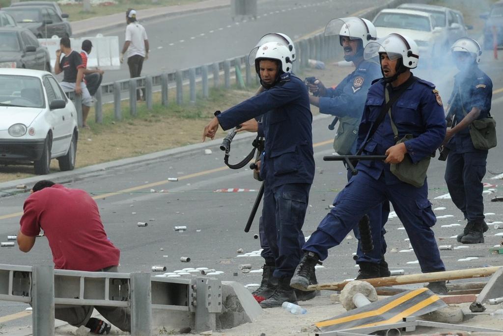 Les policiers ont tiré au fusil de chasse sur les manifestants. [KEYSTONE - Mazen Mahdi]