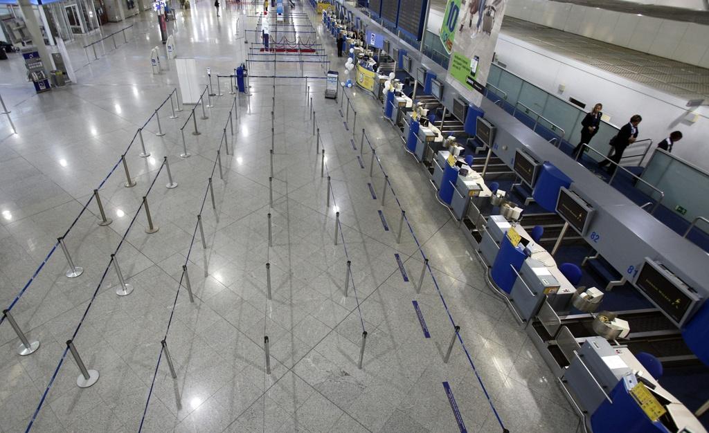 L'aéroport d'Athènes est resté vide suite à l'annulation des vols. [KEYSTONE]