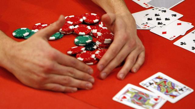 Le site de poker en ligne a amassé les fonds déposés par les joueurs pour un montant de 440 millions de dollars. [Keystone - DOMINIC FAVRE]