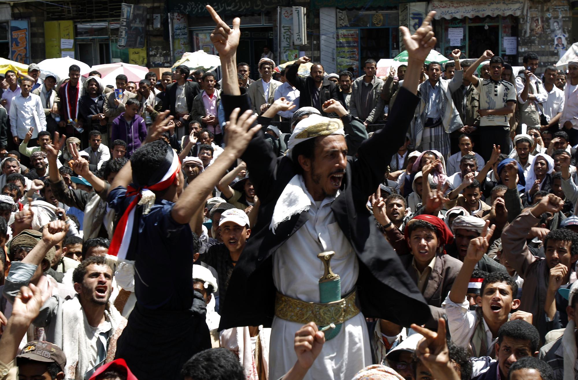 Des protestataires mercredi à Sanaa, la capitale du Yémen. [REUTERS - Khaled Abdullah]