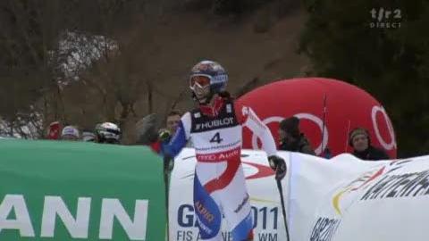 Ski alpin / Mondiaux Garmisch: super-combiné. 2e de la descente, Dominique Gisin se débrouille bien en slalom (10e), mais échoue à une ingrate 4e place au pied du podium