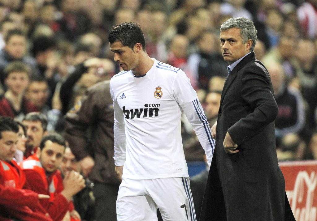 Cristiano Ronaldo est le 2e joueur le mieux payé au monde. Mais son coach José Mourinho garde la tête chez les coaches. [Keystone - Andres Kudacki]