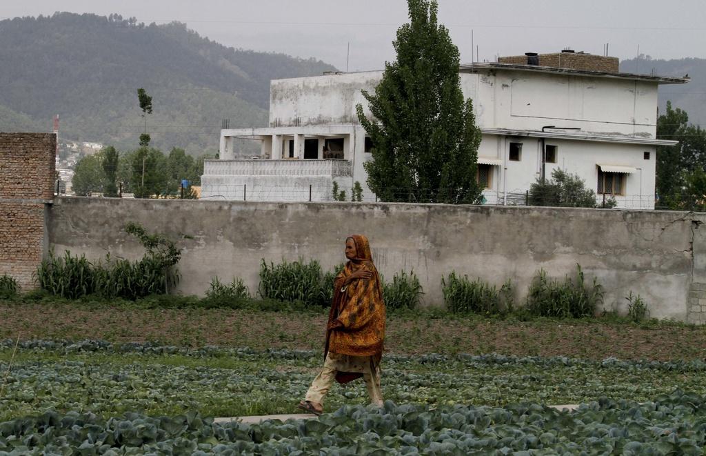 L'image non dévoilée de la dépouille de Ben Laden, tué dans cette maison d'Abbottabad au Pakistan, inspire les caricaturistes. [Anjum Naveed]