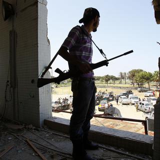 Moins de coups de feu retentissaient jeudi dans la capitale libyenne. [François Mori]