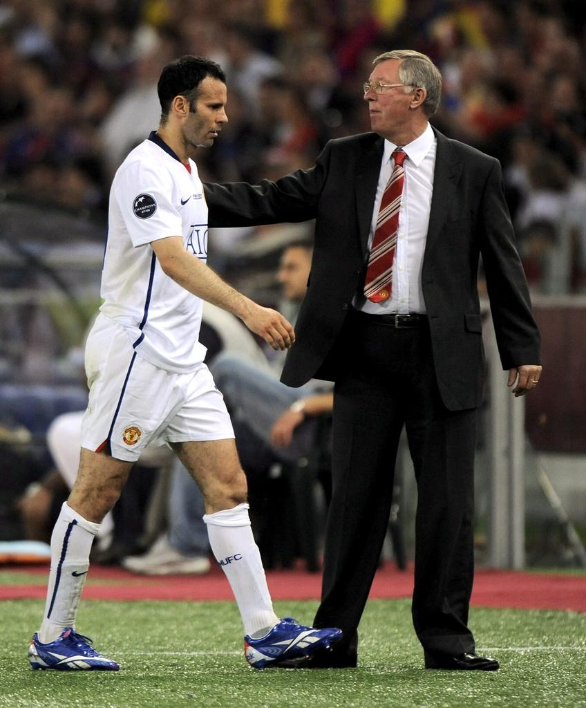 Ryan Giggs et Sir Alex Ferguson, une "collaboration" qui date quasiment des débuts de Ferguson à ManU. [Keystone - DANIEL DAL ZENNARO]