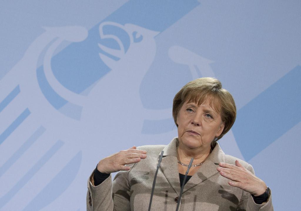 Pour Angela Merkel, la sortie de crise prendra "des années" et serait accompagnée de "revers". [KEYSTONE - Gero Breloer]