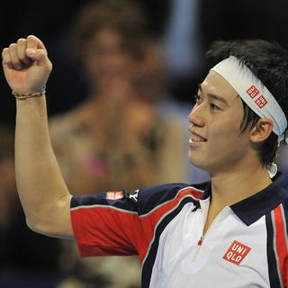 Kei Nishikori affronte Roger Federer au tournoi de tennis de Bâle le 6 novembre 2011. [Georgios Kefalas]