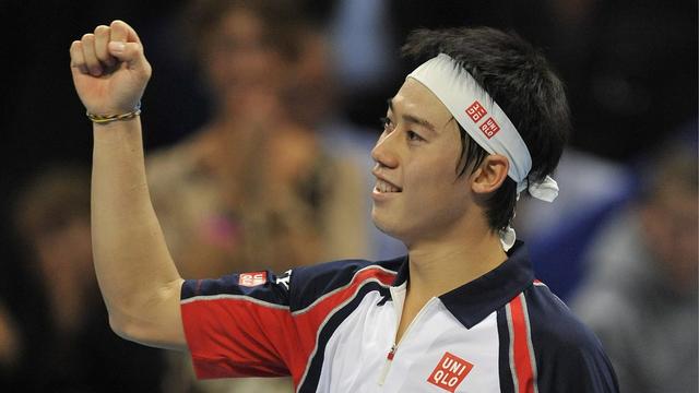 Kei Nishikori affronte Roger Federer au tournoi de tennis de Bâle le 6 novembre 2011. [Georgios Kefalas]