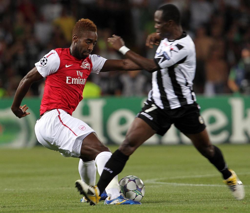 Malmenés ces derniers temps, Djourou et Arsenal ont fait le nécessaire en éliminant l'Udinese. [KEYSTONE - Paolo Giovannini]