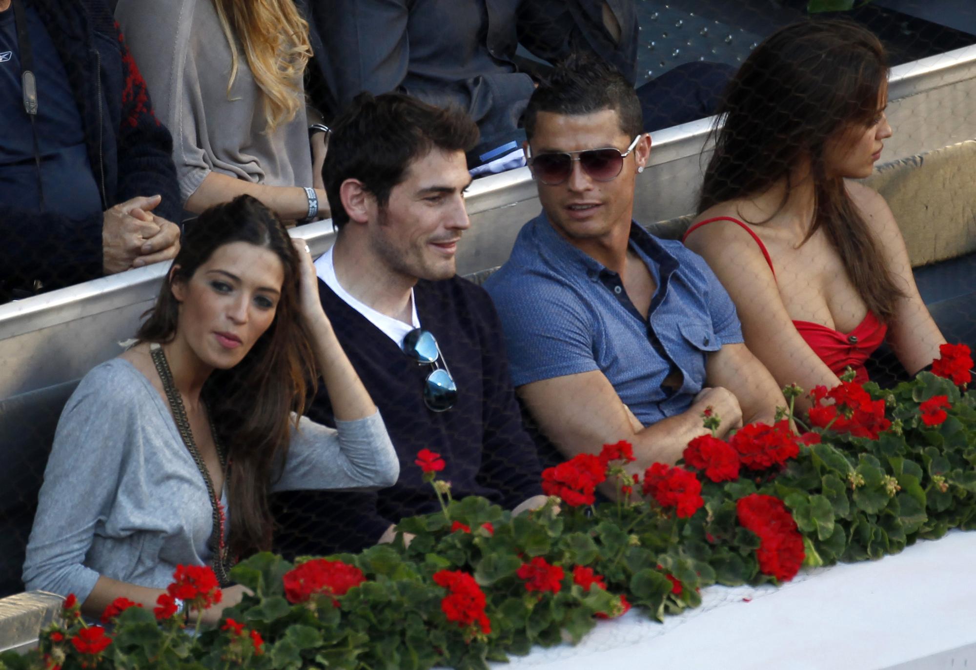 Iker Casillas et Cristiano Ronaldo (avec leur compagne) ont été des spectateurs attentifs de la finale. [Reuters - Sergio Perez]
