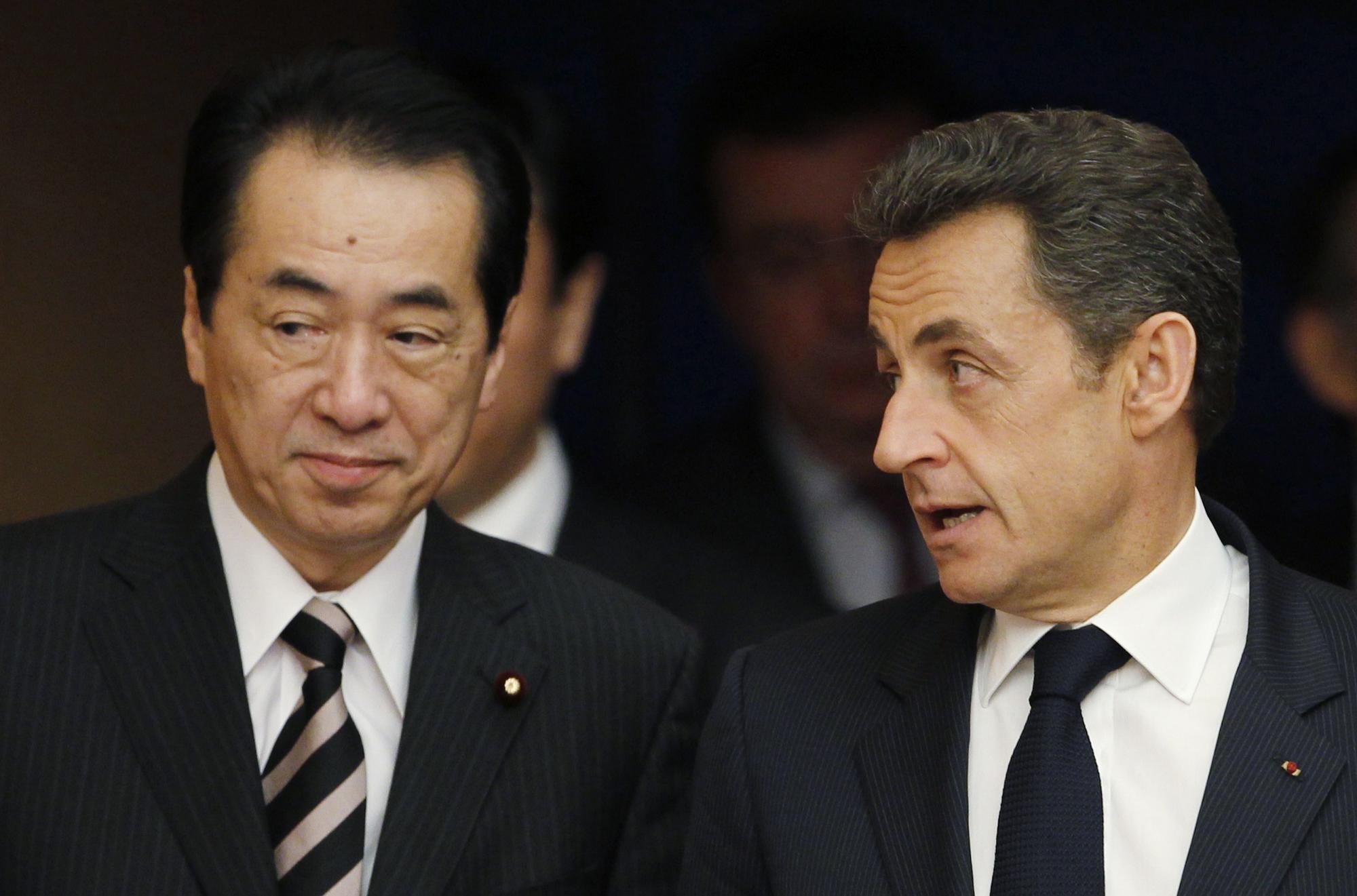 Le Premier ministra japonais Naoto Kan et Nicolas Sarkozy. [REUTERS - Toru Hanai]