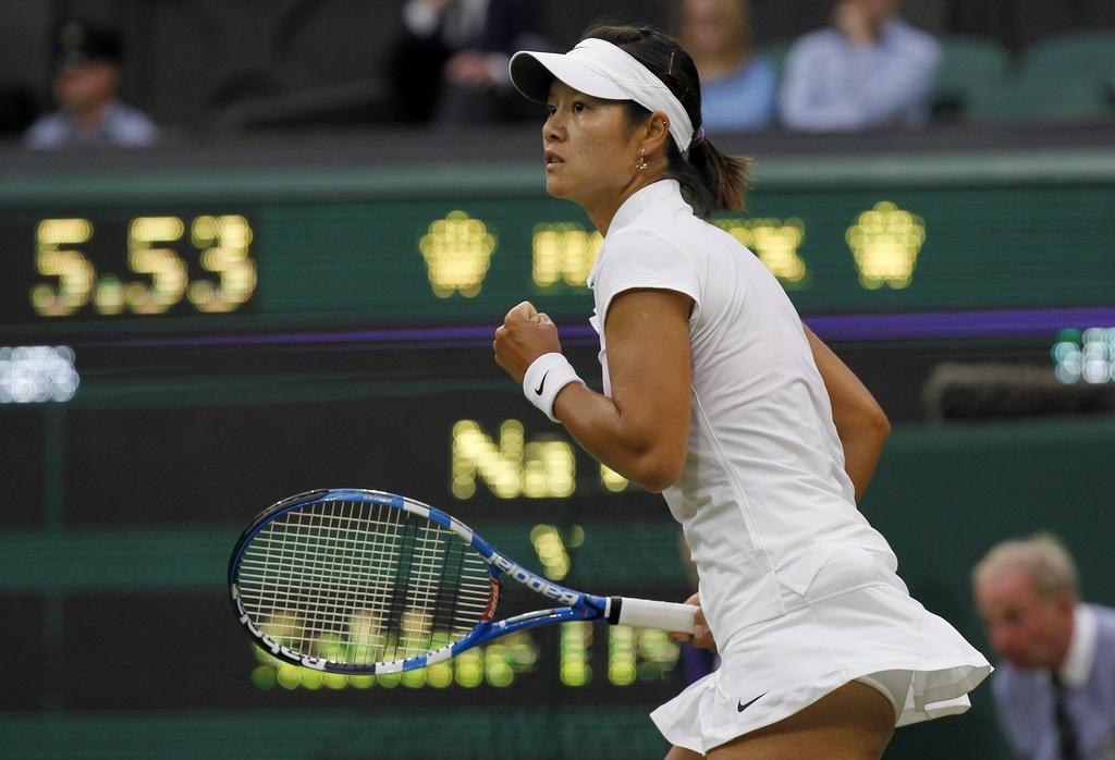 Li Na a beau serré le poing. Elle a dû s'incliner devant la puissance de Sabine Lisicki. [Anja Niedringhaus]