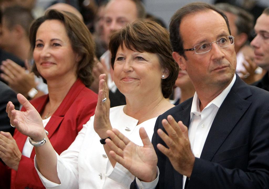 Ségolène Royal, Martine Aubry et François Hollande font partie des 6 candidats à l'investiture socialiste. [AP Photo/Bob Edme]