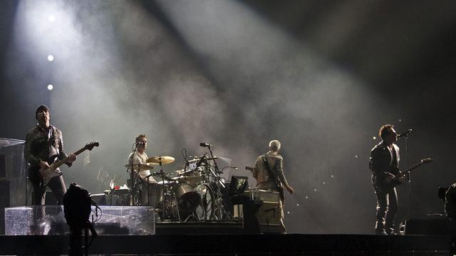 U2 lors du dernier concert de sa tournée "360 degré", au Magnetic Hill de Moncton, au Canada. [The Canadian Press/AP/Keystone - Andrew Vaughan]