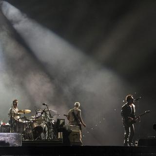 U2 lors du dernier concert de sa tournée "360 degré", au Magnetic Hill de Moncton, au Canada. [The Canadian Press/AP/Keystone - Andrew Vaughan]