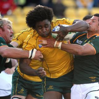 epa02958002 Wallabies player Radike Samo takes the ball up during the IRB Rugby World Cup quarter final between Australia and South Africa at Wellington Regional Stadium, in Wellington, New Zealand, on 09 October 2011. EPA/DAVE HUNT AUSTRALIA AND NEW ZEALAND OUT [Dave Hunt]
