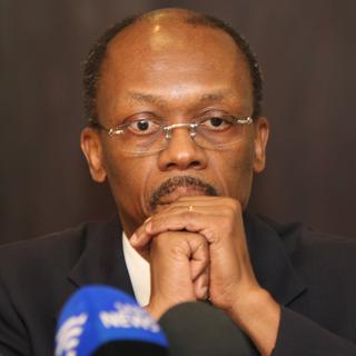 L'ancien président Aristide, lors d'une conférence en janvier 2010 Afrique du Sud où il vit.