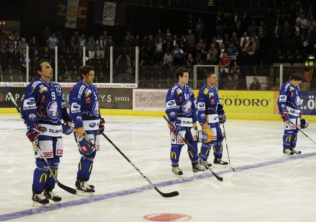 Les Lions observent une minute de silence en mémoire des victimes de Yaroslavl. [Steffen Schmidt]