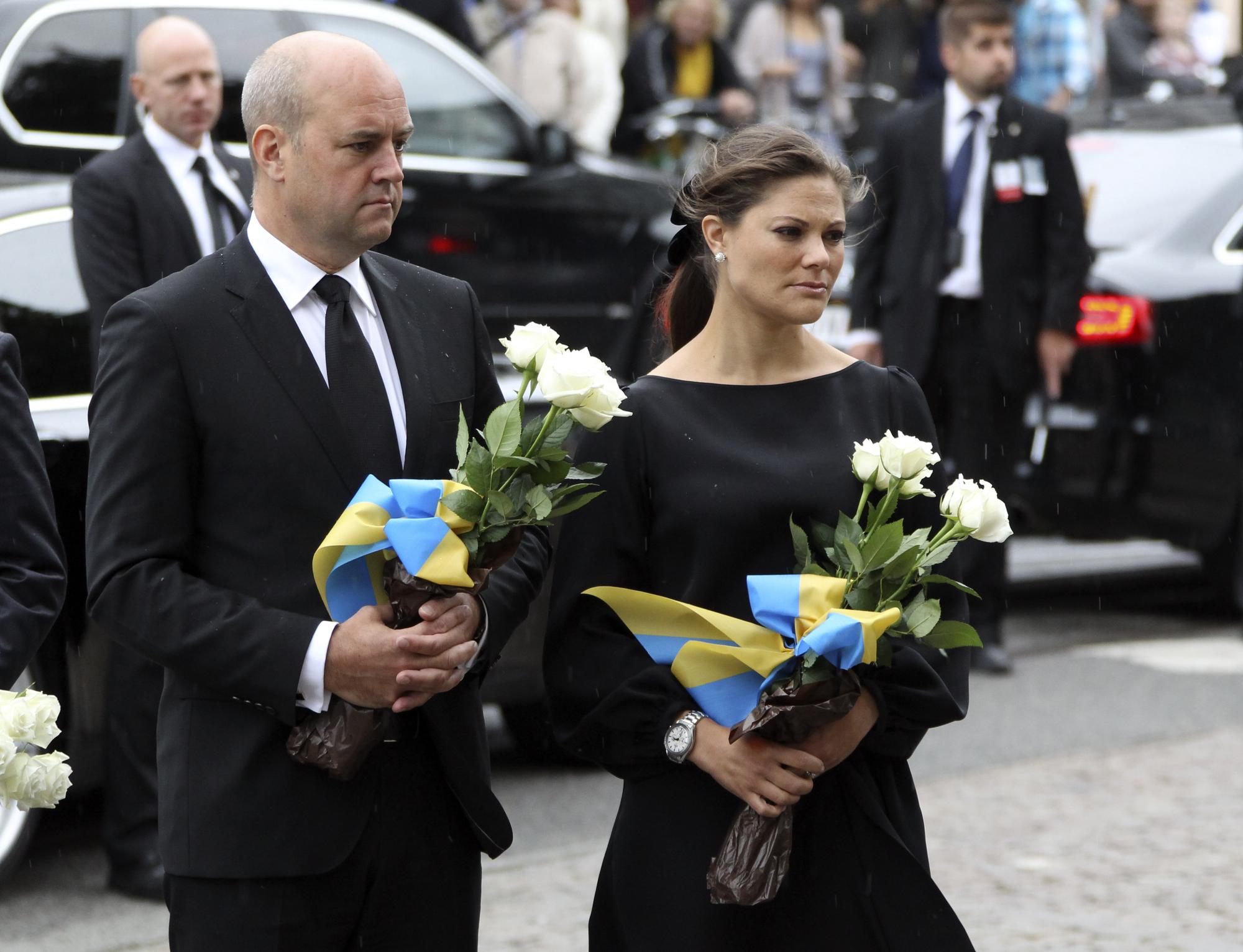 La princesse Victoria de Suède et le Premier ministre suédois Fredrik Reinfeldt étaient présents pour la commémoration. [REUTERS - Fabrizio Bensch]