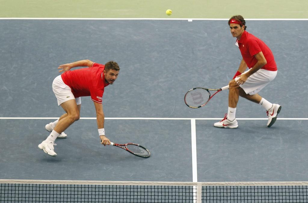 Wawrinka/Federer, un duo qu'on espère revoir lors du barrage de septembre. [KEYSTONE - PETER KLAUNZER]