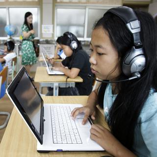 Les écoliers sud-coréens seront les premiers à abandonner leurs cahiers au profit de nouvelles technologies. [Ahn Young-joon]