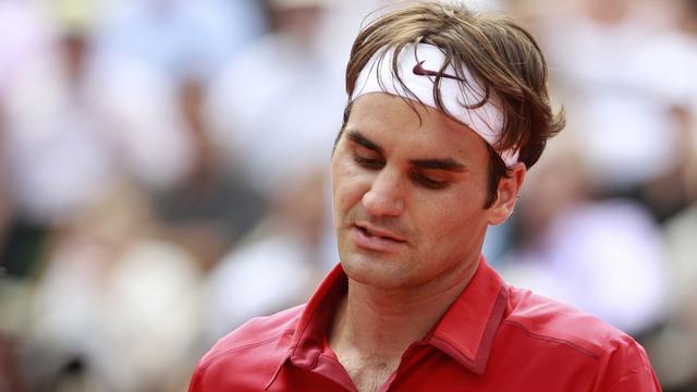 Roger Federer sera la tête de série no3 sur le gazon londonien, derrière Nadal et Djokovic. [Keystone - Vincent Kessler]