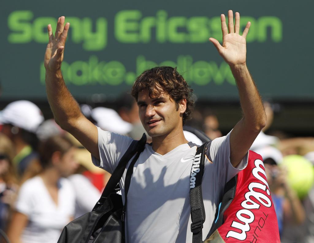 Face à Simon, Federer n'a passé que 8 minutes sur le court. [KEYSTONE - Alan Diaz]