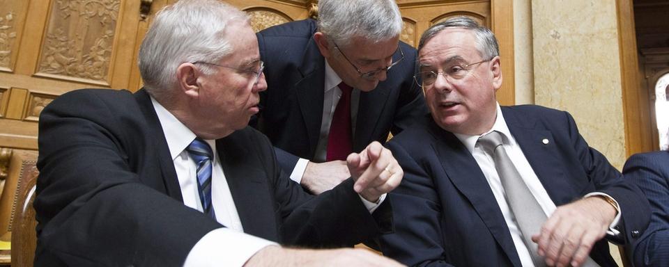 Les stratèges de l'UDC Christophe Blocher et Caspar Baader ont lancé Jean-François Rime (à droite) contre les sièges restants du PS et du PLR.