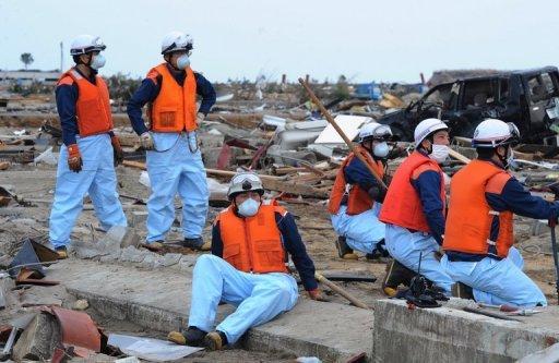 Une équipe de secouristes à Natori, dans la préfecture de Miyagi au Japon, le 14 mars 2011