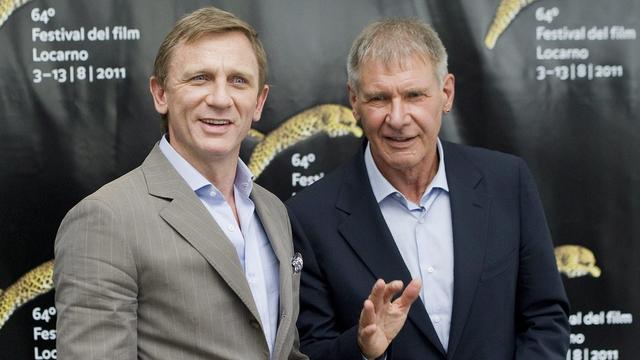 L'acteur britannique Daniel Craig et l'Américain Harrison Ford étaient samedi à Locarno pour présenter leur dernier film intitulé "Cowboys and Aliens". [Jean-Christophe Bott]