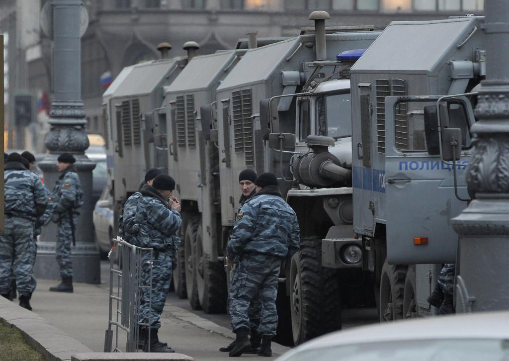 Vendredi, les forces de l'ordre étaient déployées en nombre aux alentours de la Place Rouge à Moscou. [KEYSTONE - Ivan Sekretarev]