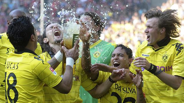 Avec une moyenne de 23 ans d'âge, Dortmund est l'équipe titrée la plus jeune de l'histoire de la Bundesliga. [Mark Keppler]