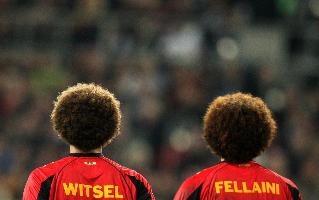 Witsel et Fellaini peuvent s'arracher les cheveux: ils sont passés tout près d'une qualification. [Rolf Wennenbernd]