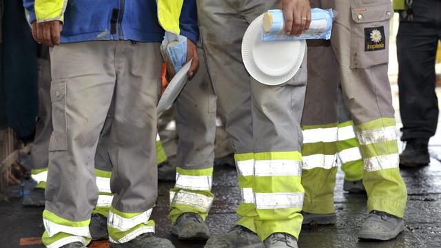 Manifestation des ouvriers de la construction à Berne. [KEYSTONE - Martial Trezzini]