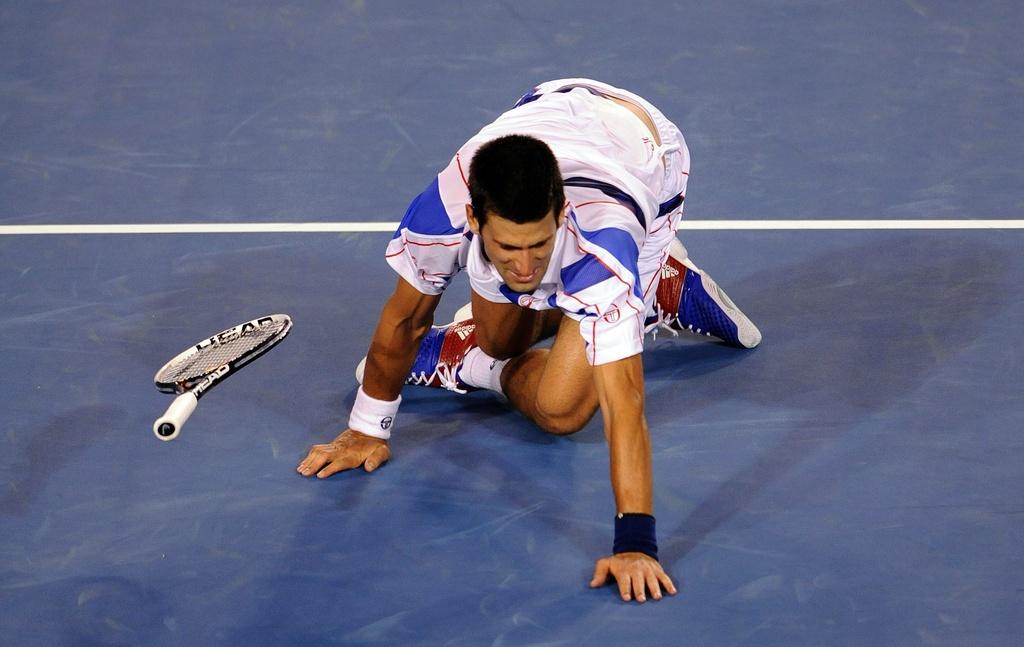 Novak Djokovic jouera sa 2e finale à Melbourne après son triomphe de 2008 face à Tsonga. [Keystone - JOE CASTRO]
