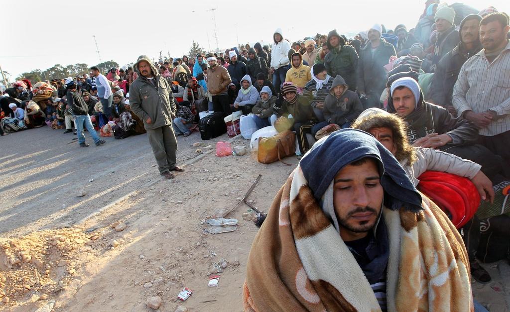 Le Croissant-Rouge et le Haut commissariat aux réfugiés s'alarment de la situation humanitaire aux frontières libyennes. [Mohamed Messara]