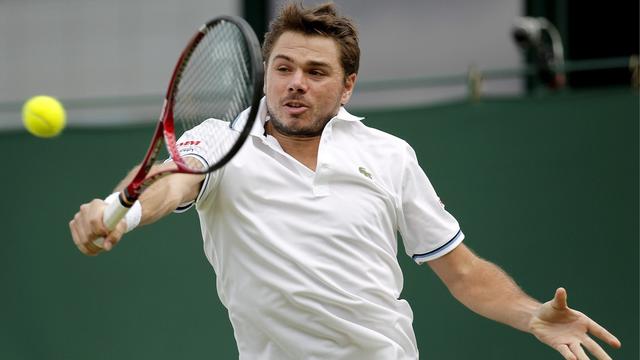 Grosse désillusion pour Stanislas Wawrinka. Le Vaudois a été sorti au 2e tour à Wimbledon. [Keystone - KERIM OKTEN]