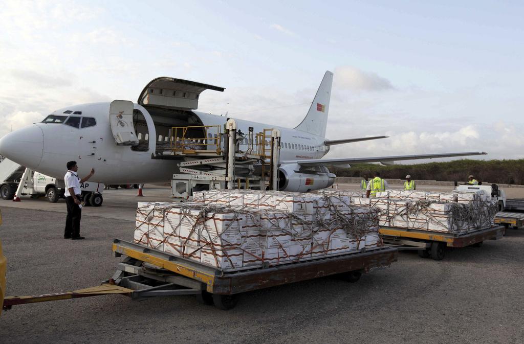 10 tonnes de suppléments nutritionnels pour les enfants souffrant de malnutrition ont déjà été acheminés à Mogadiscio. [KEYSTONE - Feisal Omar]