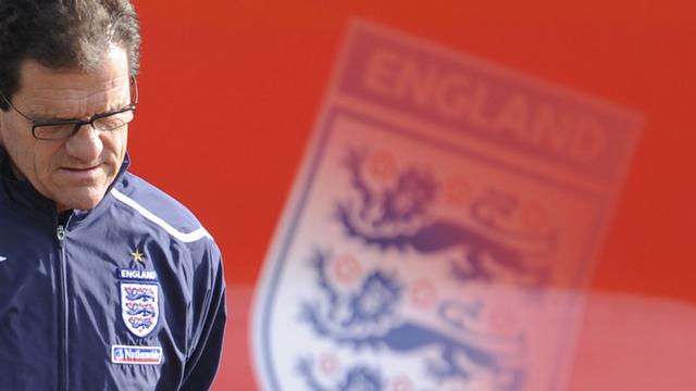 England soccer coach Fabio Capello arrives for a training session at London Colney near London October 10, 2008. England play Kazakhstan in a World Cup qualifying group match on Saturday. REUTERS/Toby Melville (BRITAIN) [Toby Melville]